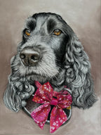 Dog wearing a pink bow with a pattern on a beige background