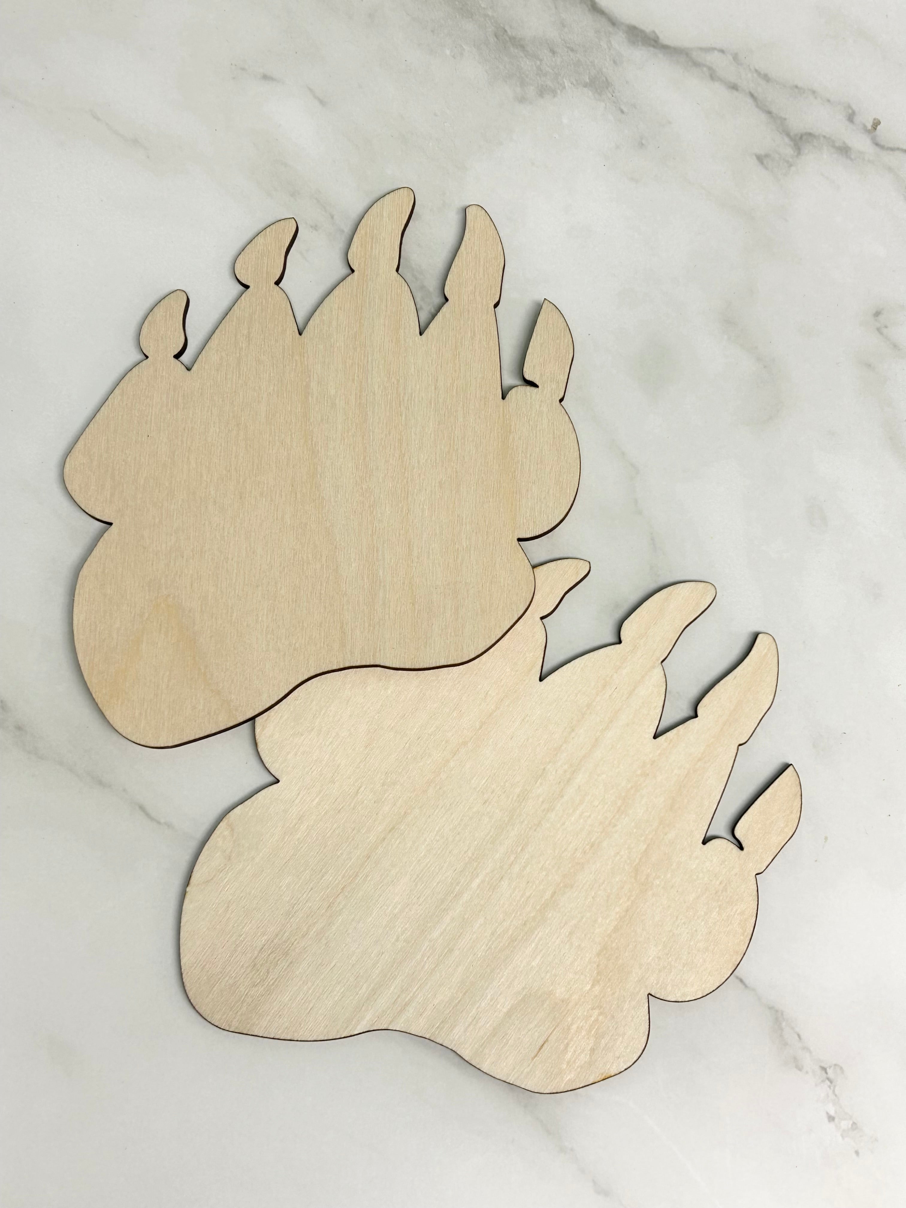 wooden cut out of bear paw shape